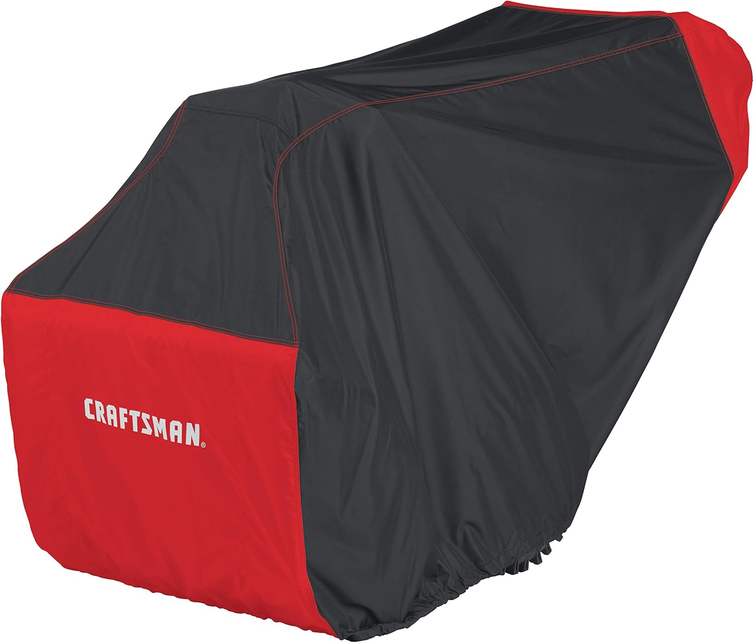 Craftsman snow blower cover being pulled over a snow blower in a driveway